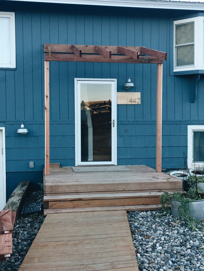 The happy crazy house front porch